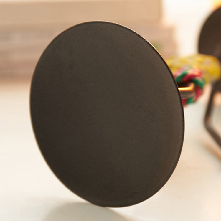 Retro Wrought Iron Man-shaped Candlestick Ornament, showcasing a unique design perfect for home and restaurant decor.