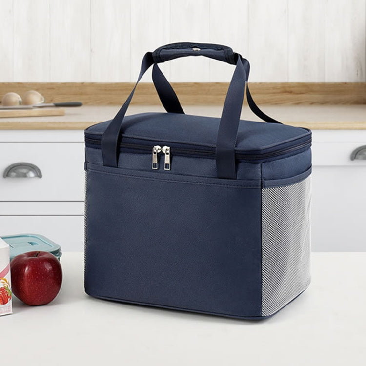 A stylish and functional reusable lunch bag, insulated for freshness, featuring a waterproof outer layer and convenient storage pockets.