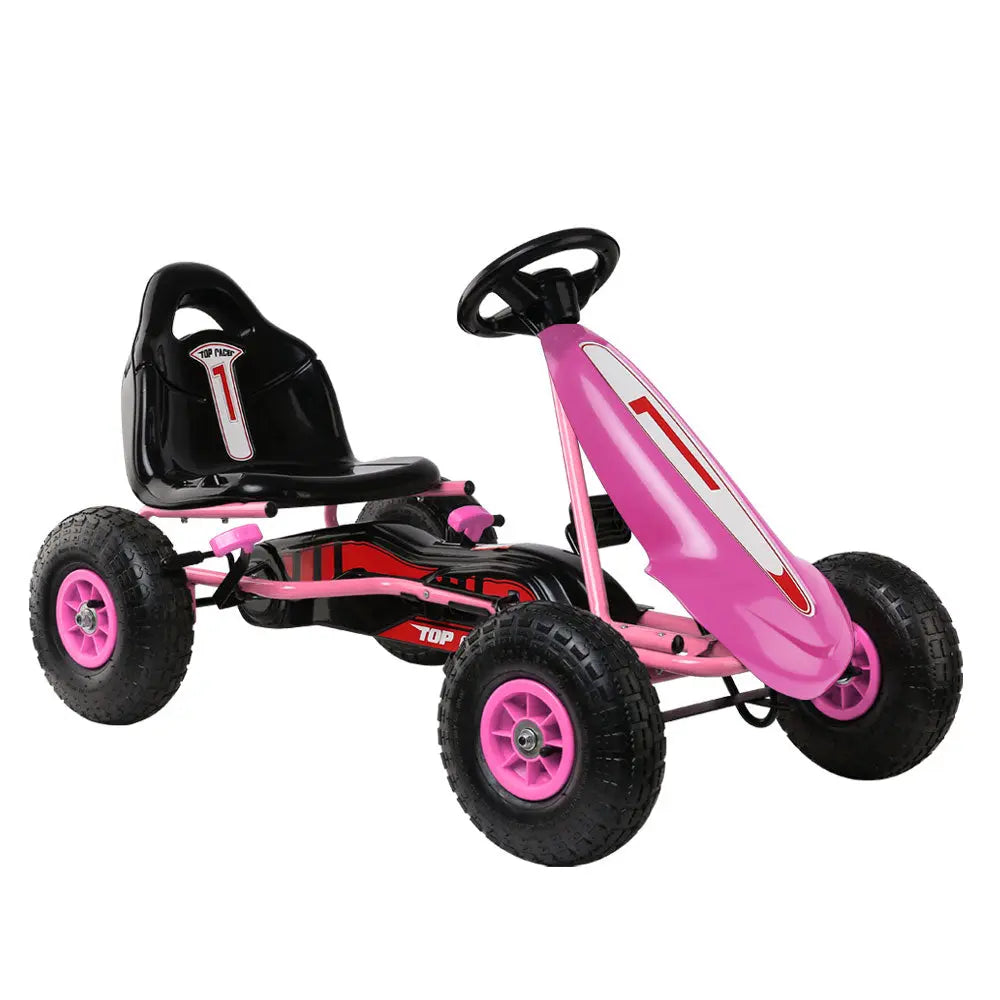 Rigo Kids Pedal Go Kart in vibrant pink color, featuring a sturdy steel frame, adjustable seat, and large rubber tyres for a smooth ride.