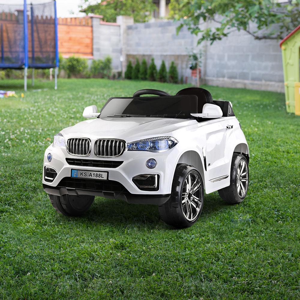 Rigo Kids Ride On Car in white color, resembling a BMW X5, showcasing its sleek design, working doors, and bright headlights.