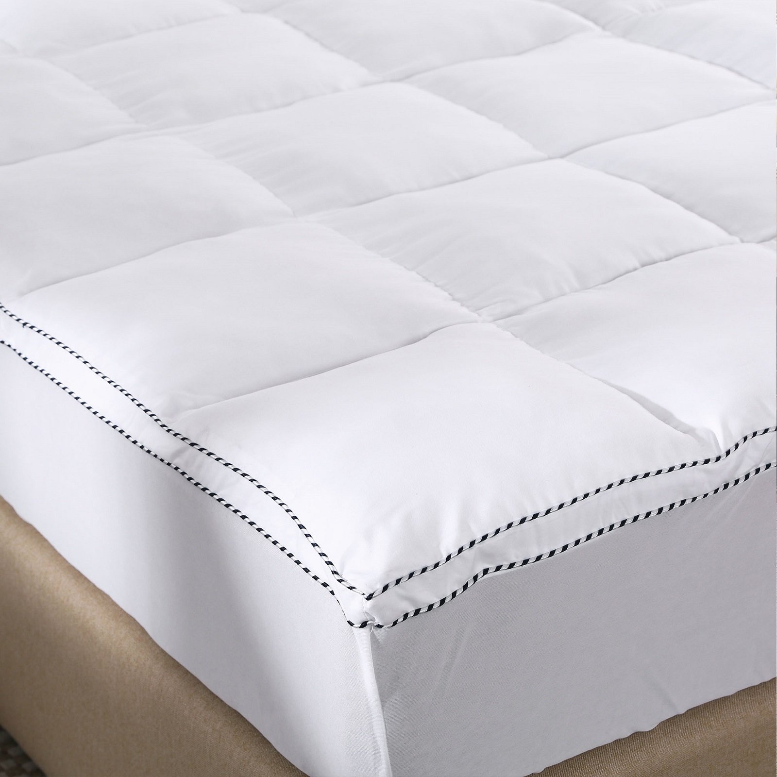 Royal Comfort 1000GSM Luxury Bamboo Fabric Gusset Mattress Pad Topper with a plush design and fitted skirt for secure placement.