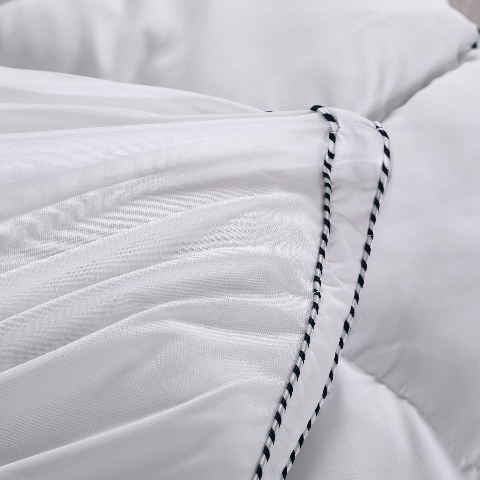 Royal Comfort 1000GSM Luxury Bamboo Fabric Gusset Mattress Pad Topper with a plush design and fitted skirt for secure placement.