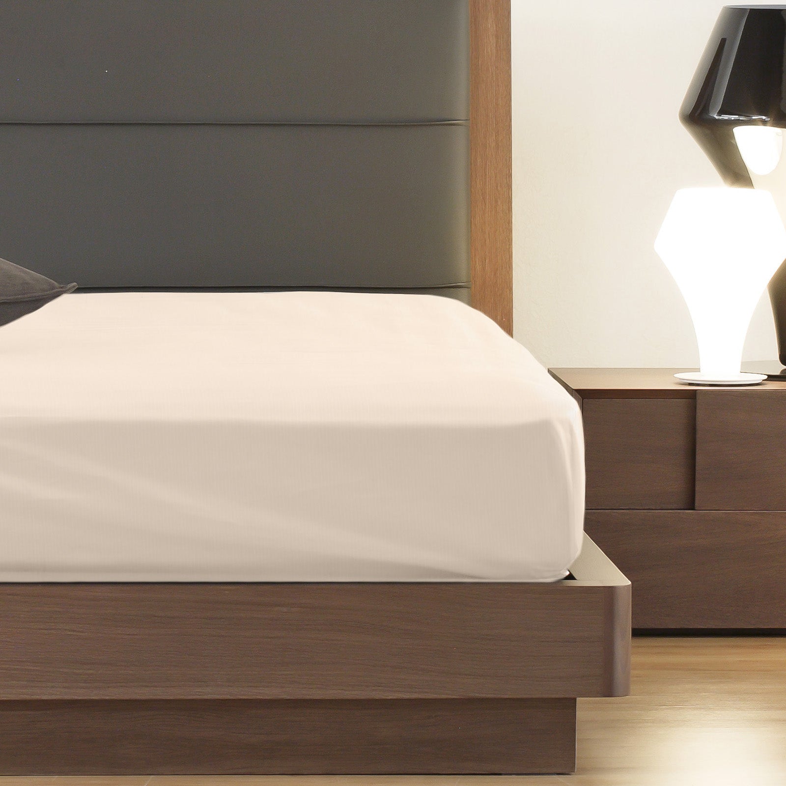 Royal Comfort 1200 Thread Count Fitted Sheet in various colors, showcasing its luxurious texture and quality fabric.