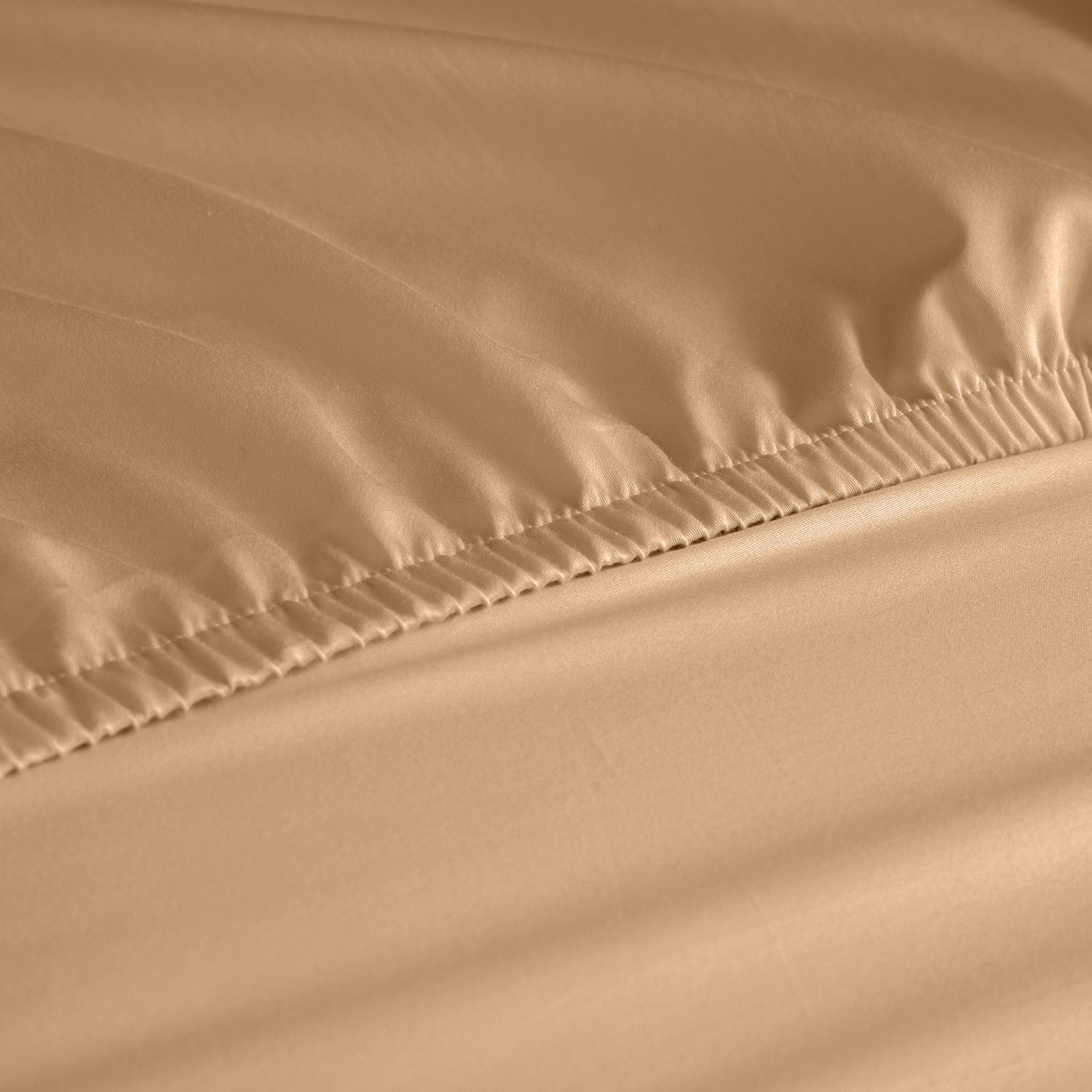 Royal Comfort 1200 Thread Count Fitted Sheet in various colors, showcasing its luxurious texture and quality fabric.