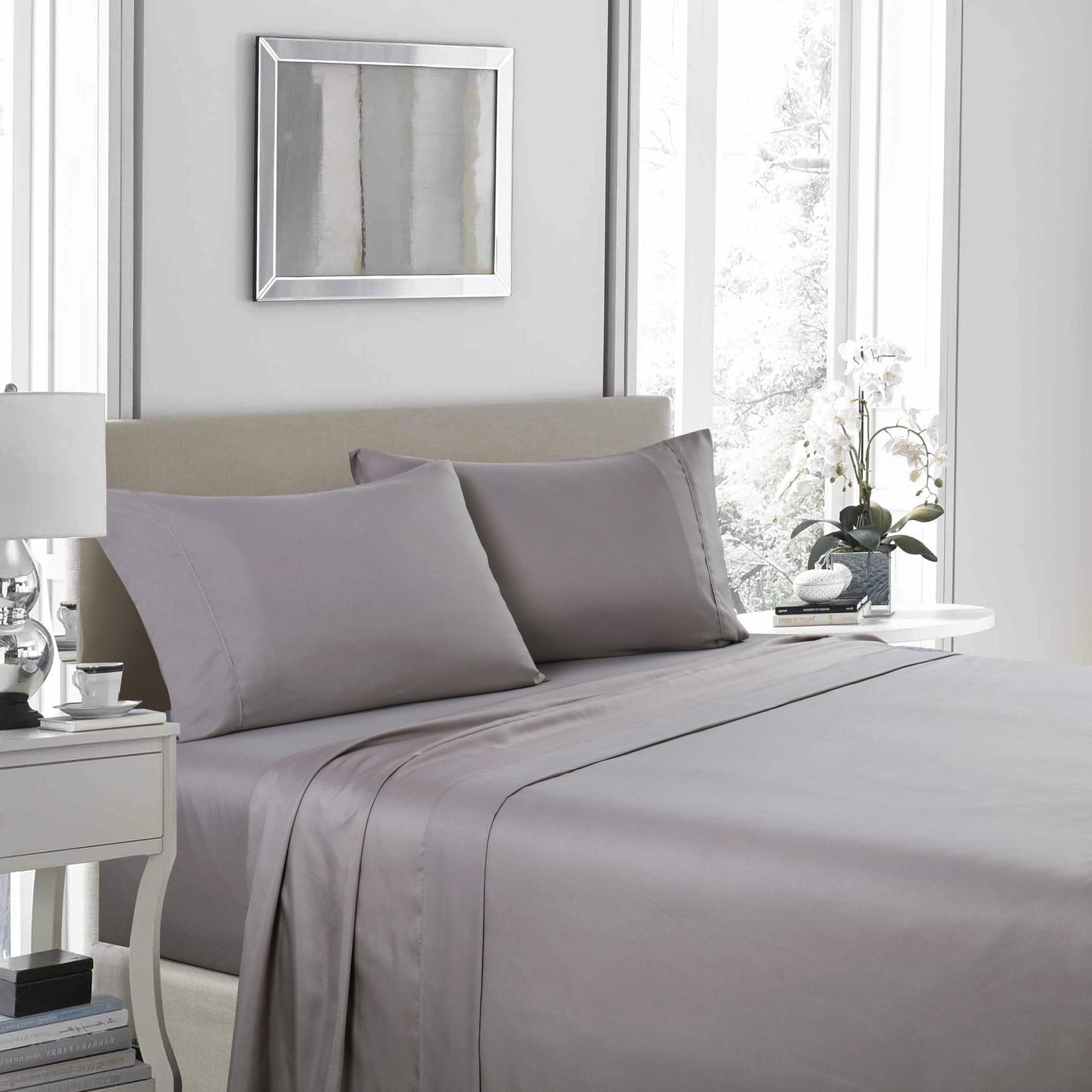Royal Comfort 1200 Thread Count Sheet Set in elegant satin fabric, showcasing flat sheet, fitted sheet, and two pillowcases in various colors.