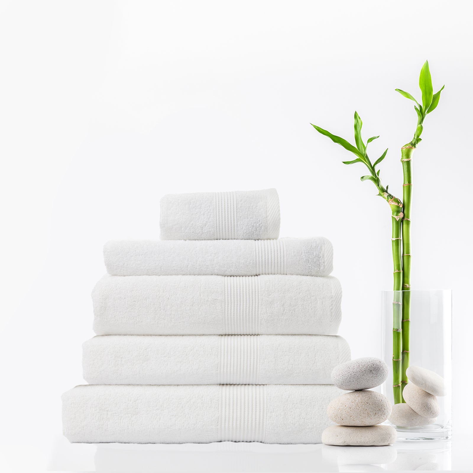 Royal Comfort 5 Piece Cotton Bamboo Towel Set featuring plush bath towels, hand towel, wash towel, and bath mat in soft colors.