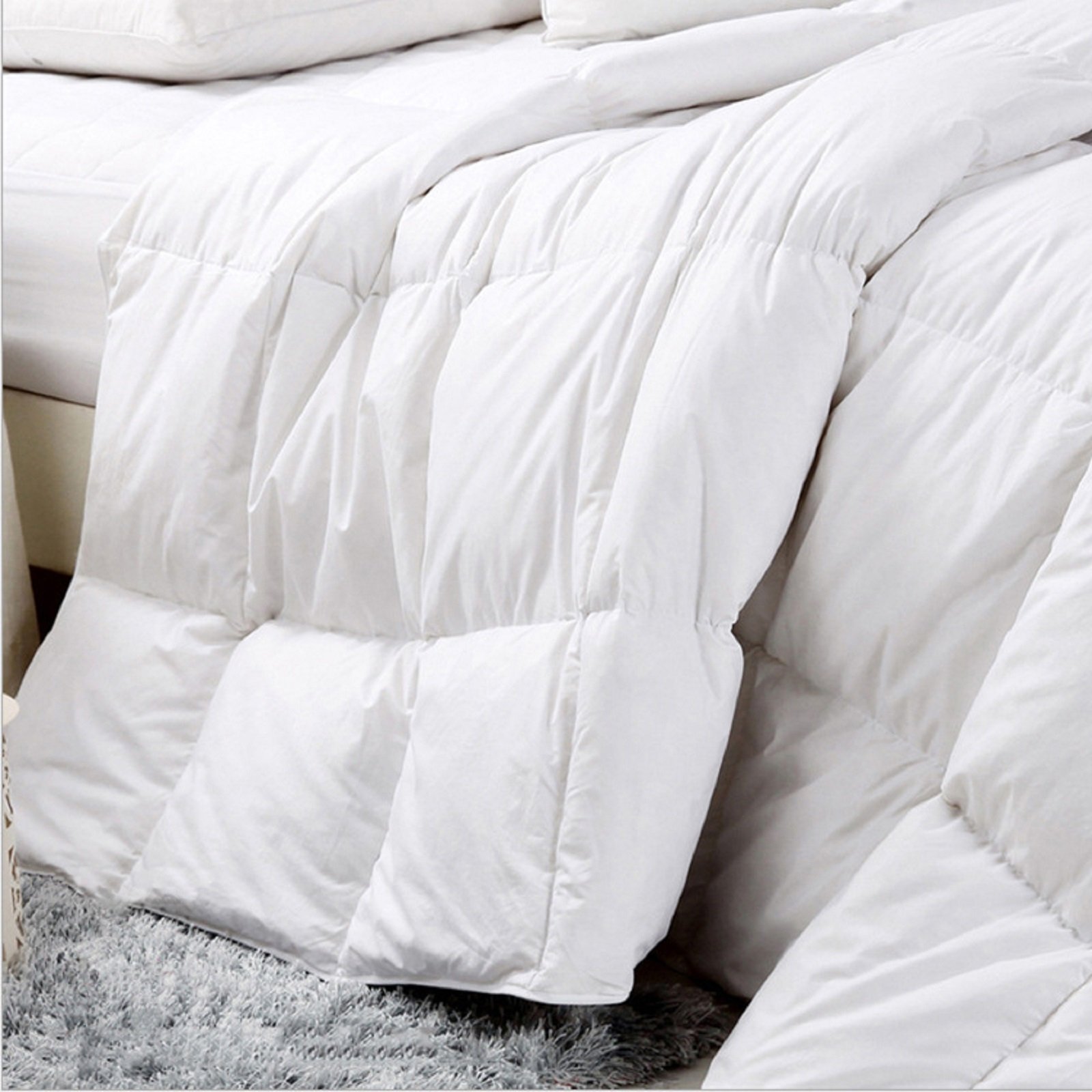 Royal Comfort 500GSM Plush Duck Feather Down Quilt, showcasing its soft cotton cover and fluffy filling, perfect for cozy nights.