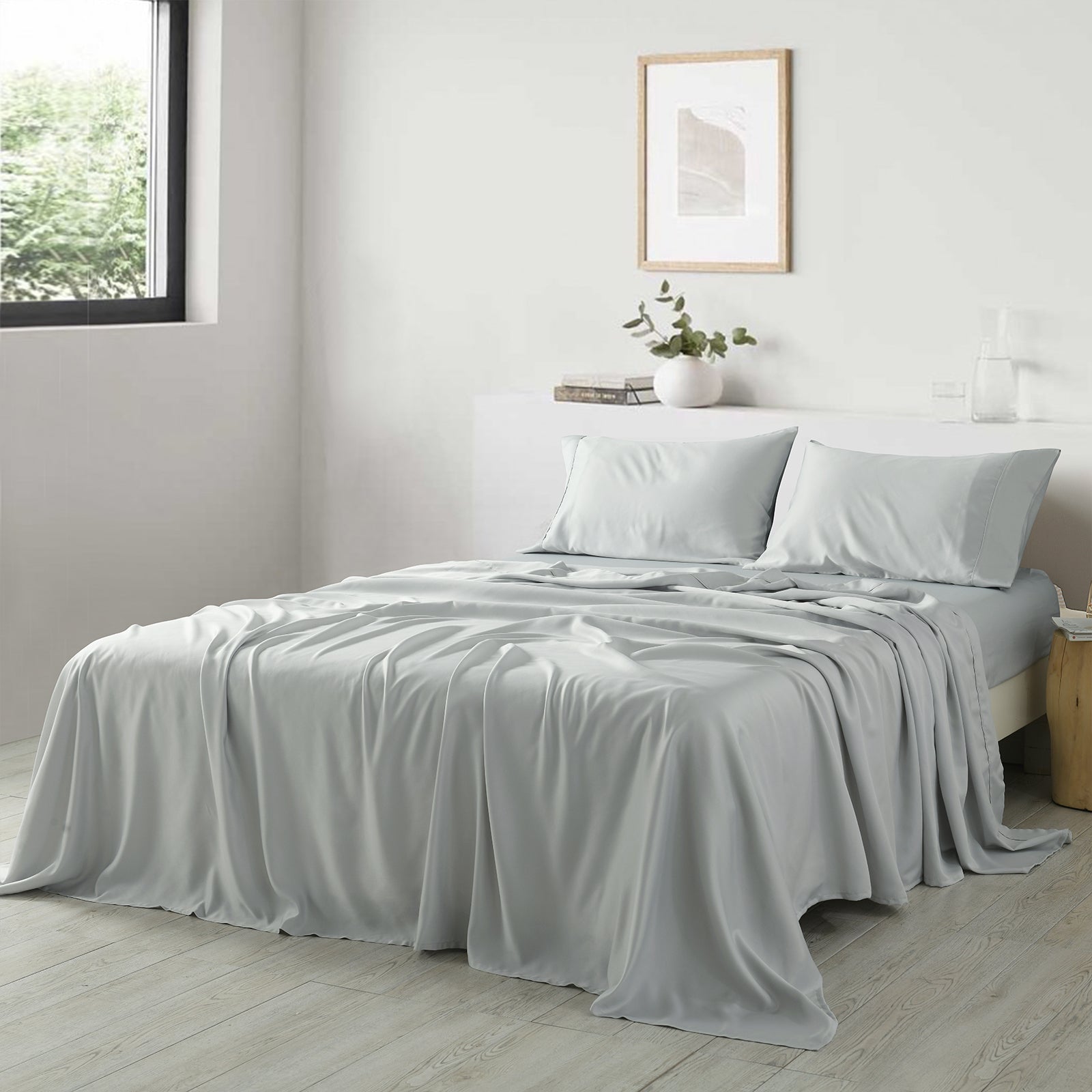 Royal Comfort 600 Thread Count Cooling Ultra Soft Tencel Eucalyptus sheets set, featuring a fitted sheet, flat sheet, and two pillowcases in elegant design.