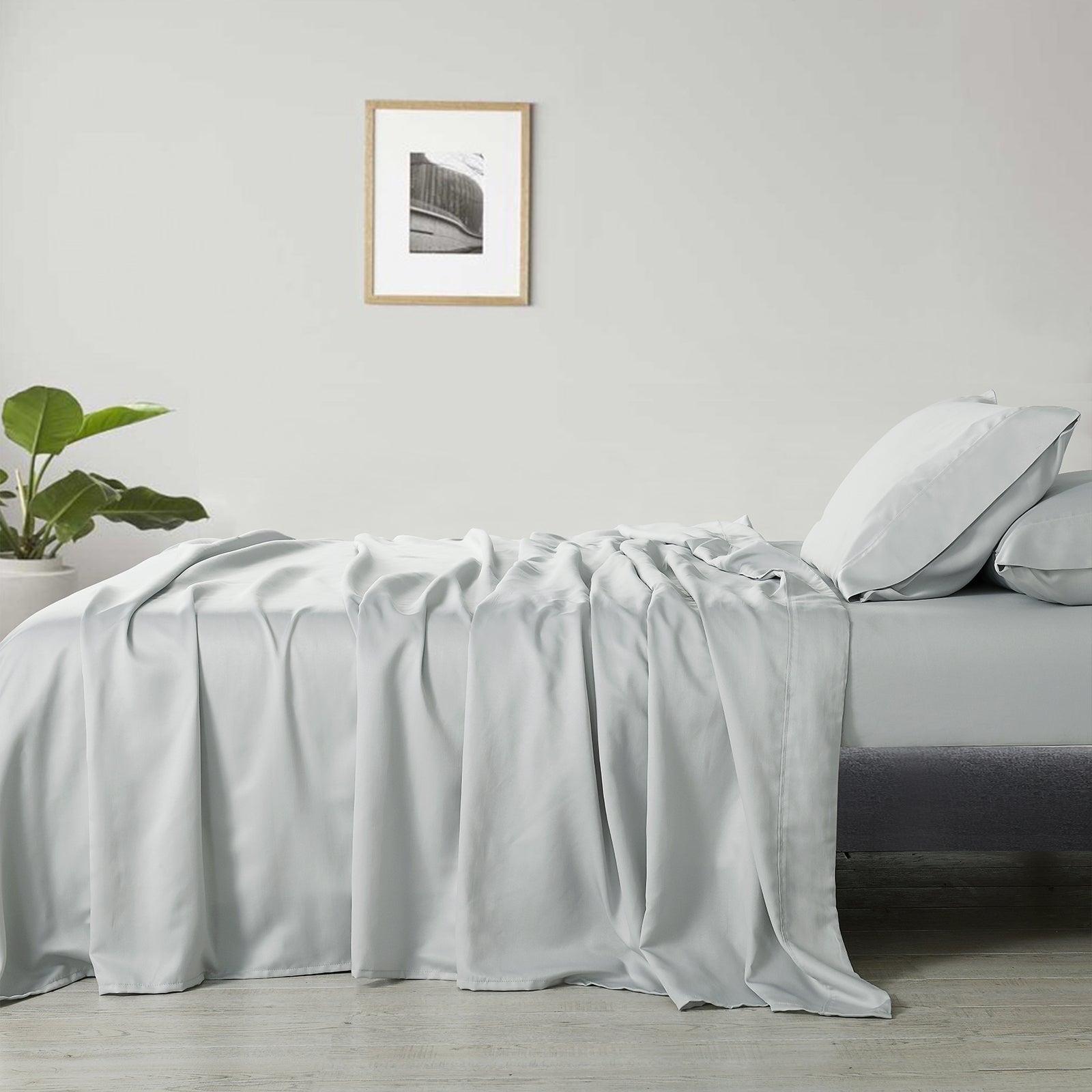 Royal Comfort 600 Thread Count Cooling Ultra Soft Tencel Eucalyptus sheets set, featuring a fitted sheet, flat sheet, and two pillowcases in elegant design.