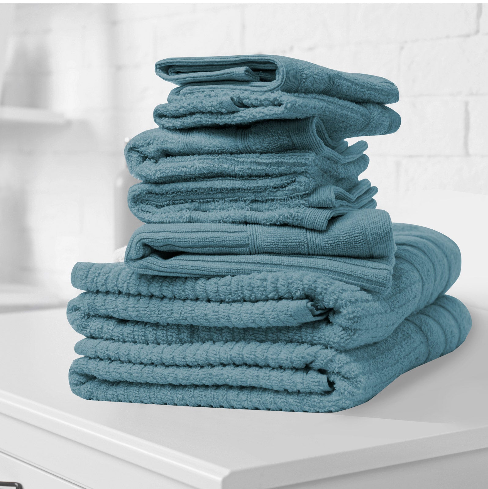 Royal Comfort Eden Egyptian Cotton 600GSM 8 Piece Luxury Bath Towels set in various colors, showcasing their softness and elegant design.