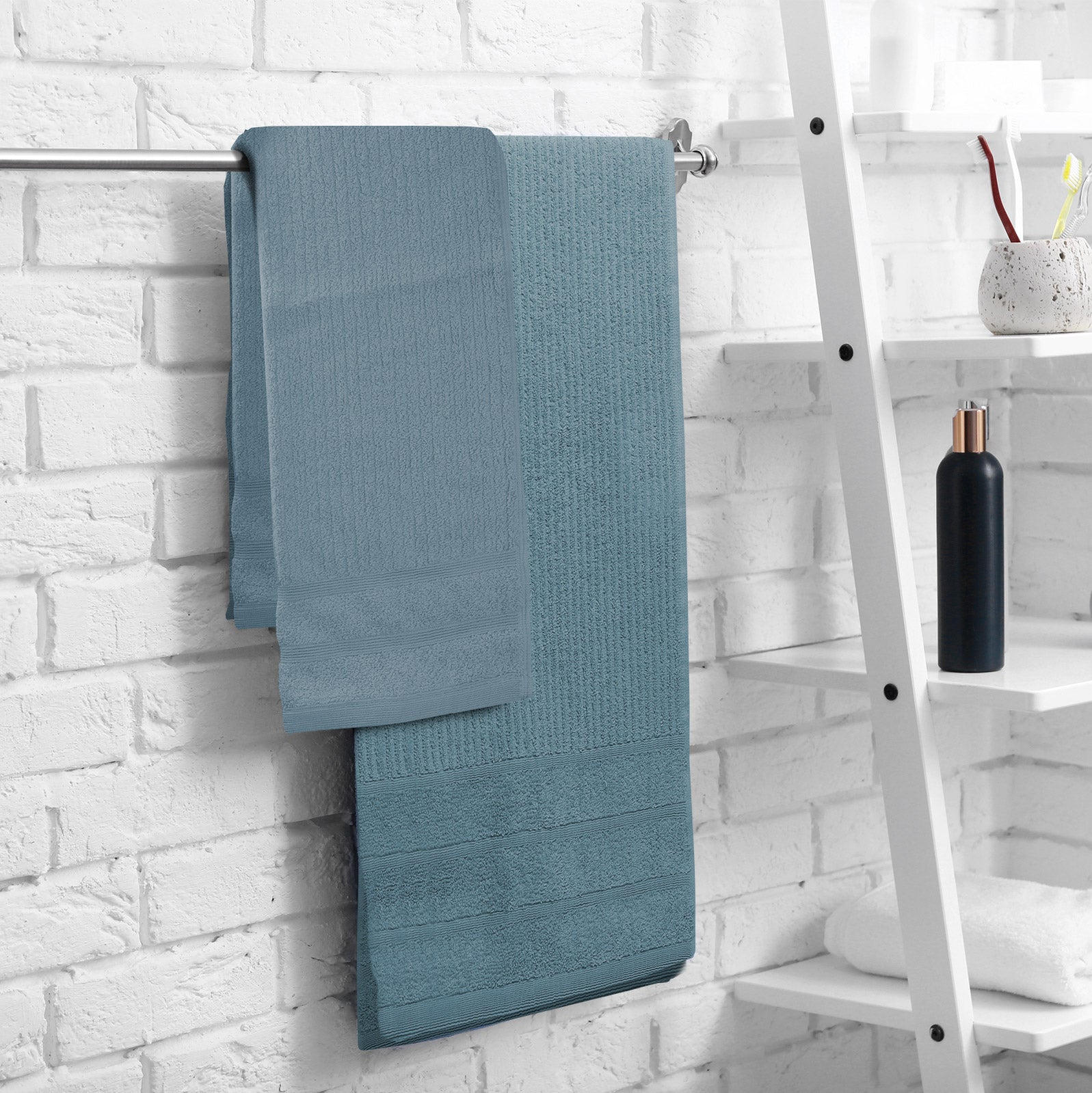 Royal Comfort Eden Egyptian Cotton 600GSM 8 Piece Luxury Bath Towels set in various colors, showcasing their softness and elegant design.