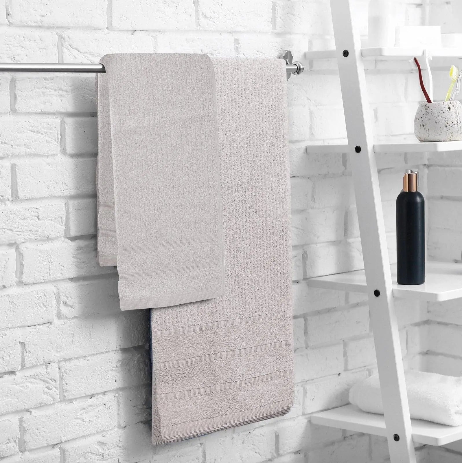 Royal Comfort Eden Egyptian Cotton 600GSM 8 Piece Luxury Bath Towels set featuring various colors and a plush texture.