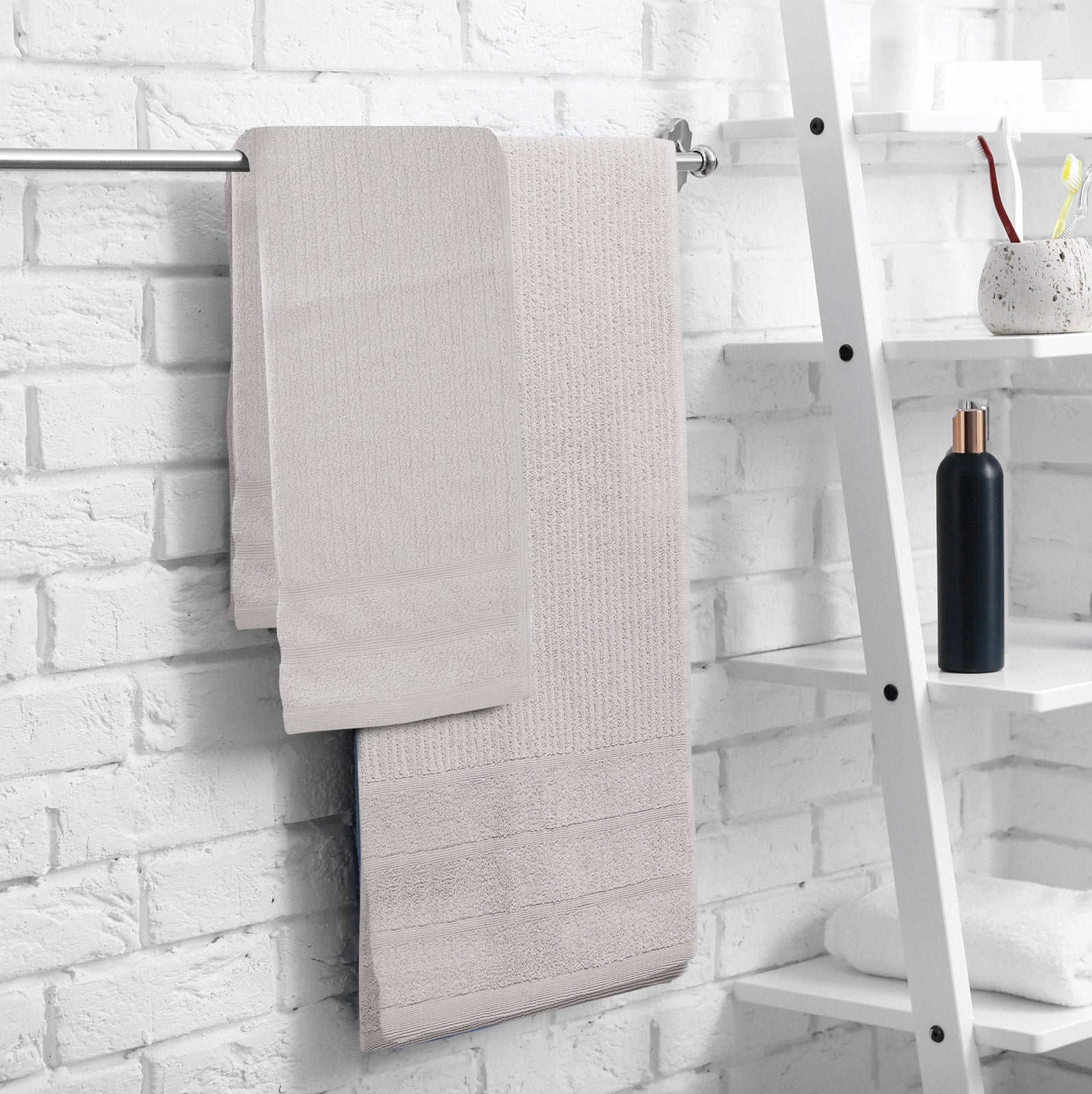 Royal Comfort Eden Egyptian Cotton 600GSM 8 Piece Luxury Bath Towels set featuring various colors and a plush texture.