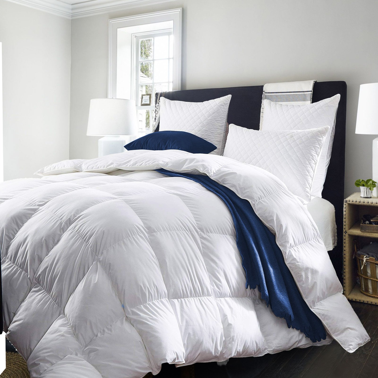Royal Comfort Quilt featuring 50% duck down and 50% duck feather, encased in a soft 233TC cotton cover, showcasing its luxurious design and quality.