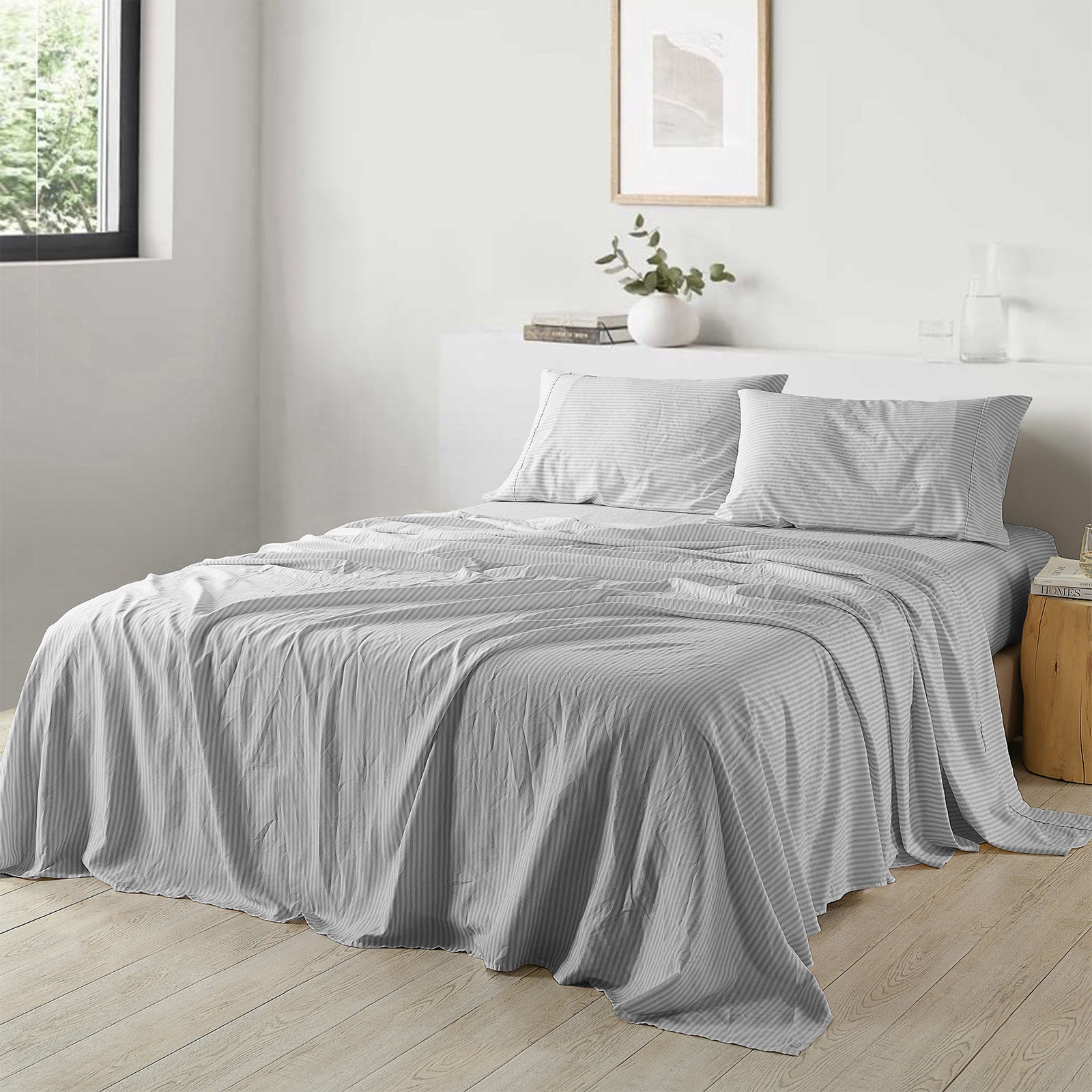 Royal Comfort Stripes Linen Blend Sheet Set featuring a neutral stripe design, showcasing its luxurious texture and breathable fabric.