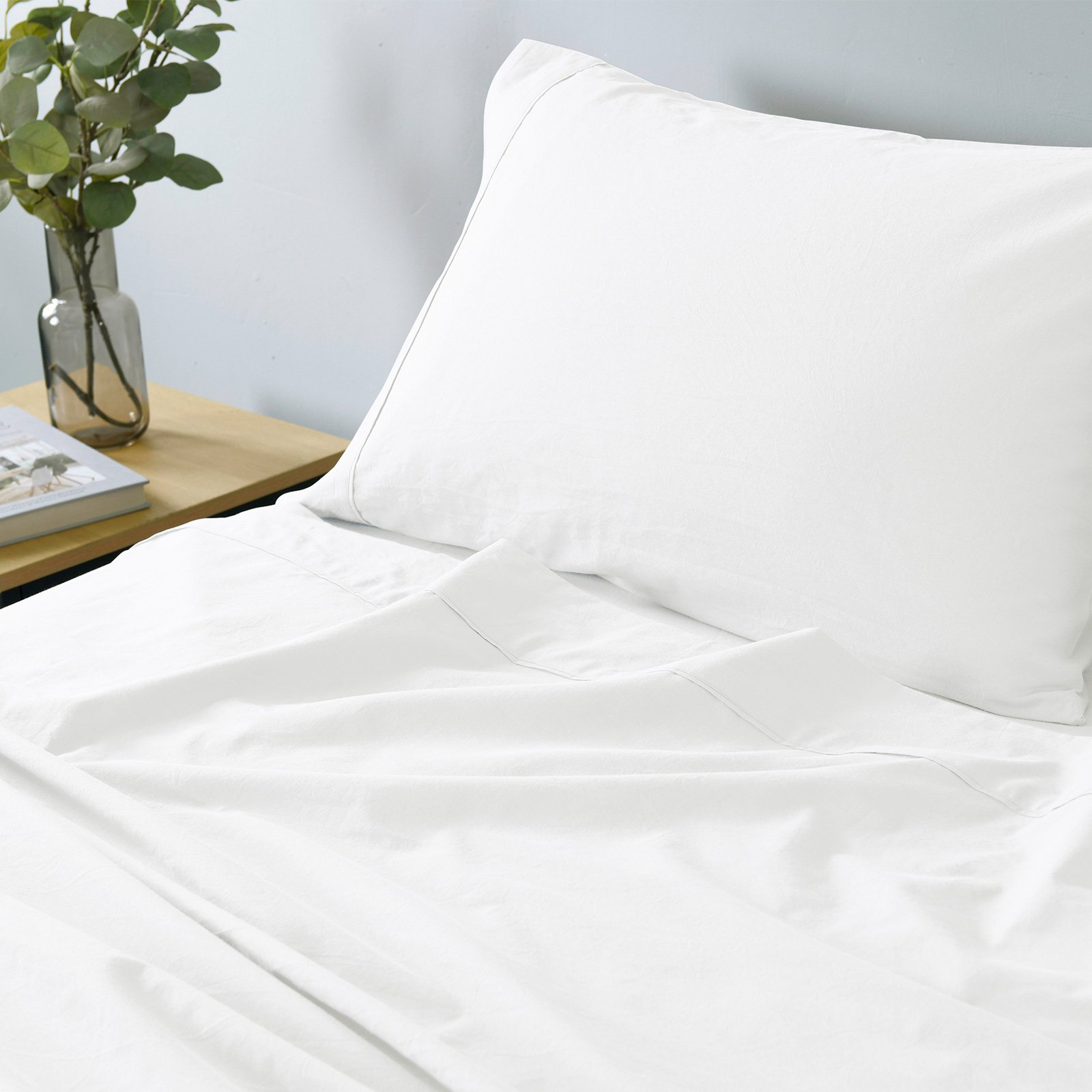 Royal Comfort Vintage Washed 100% Cotton Sheet Set displayed in various colors, showcasing its soft texture and elegant design.