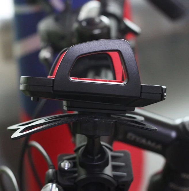 Rubber Phone Holder Handlebar for bicycles, securely holding a smartphone in a vibrant color.