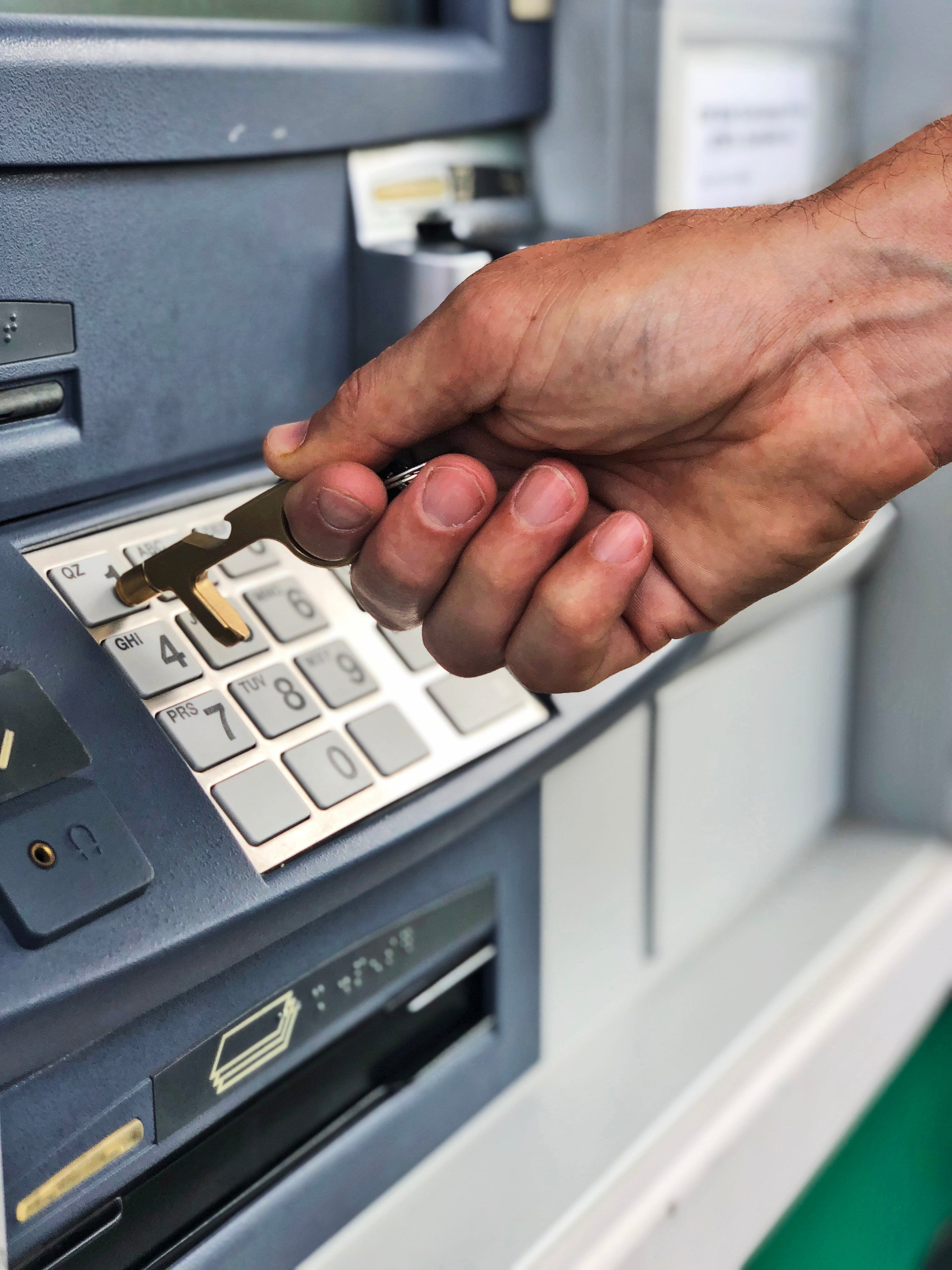 Safe Key Contact-Less LED Keychain Multi-Tool in rose gold, silver, and purple, showcasing its ergonomic design and multiple functionalities.