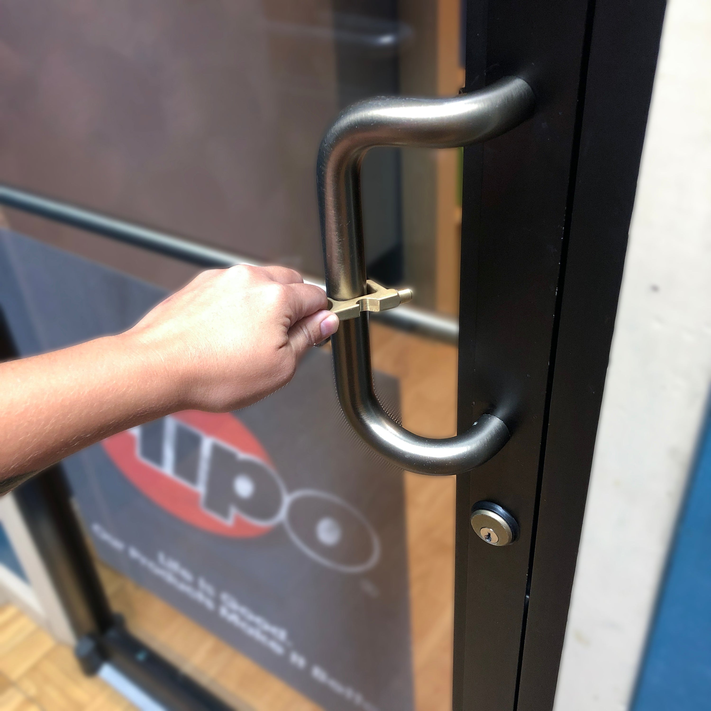 Safe Key Contact-Less LED Keychain Multi-Tool in rose gold, silver, and purple, showcasing its ergonomic design and multiple functionalities.