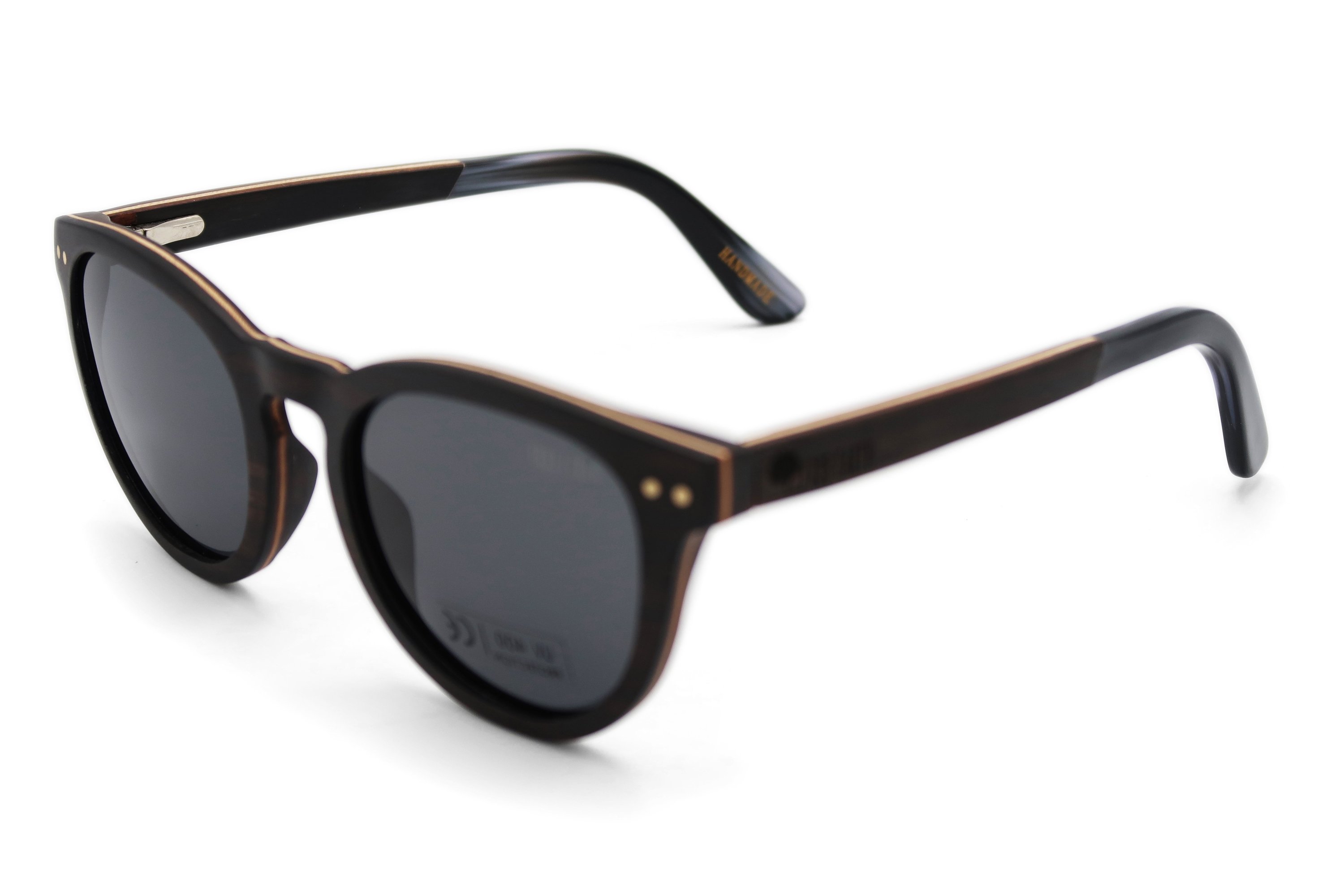 Santa Monica sunglasses featuring a stylish zebra wood frame and polarized lenses, perfect for sun protection and outdoor activities.