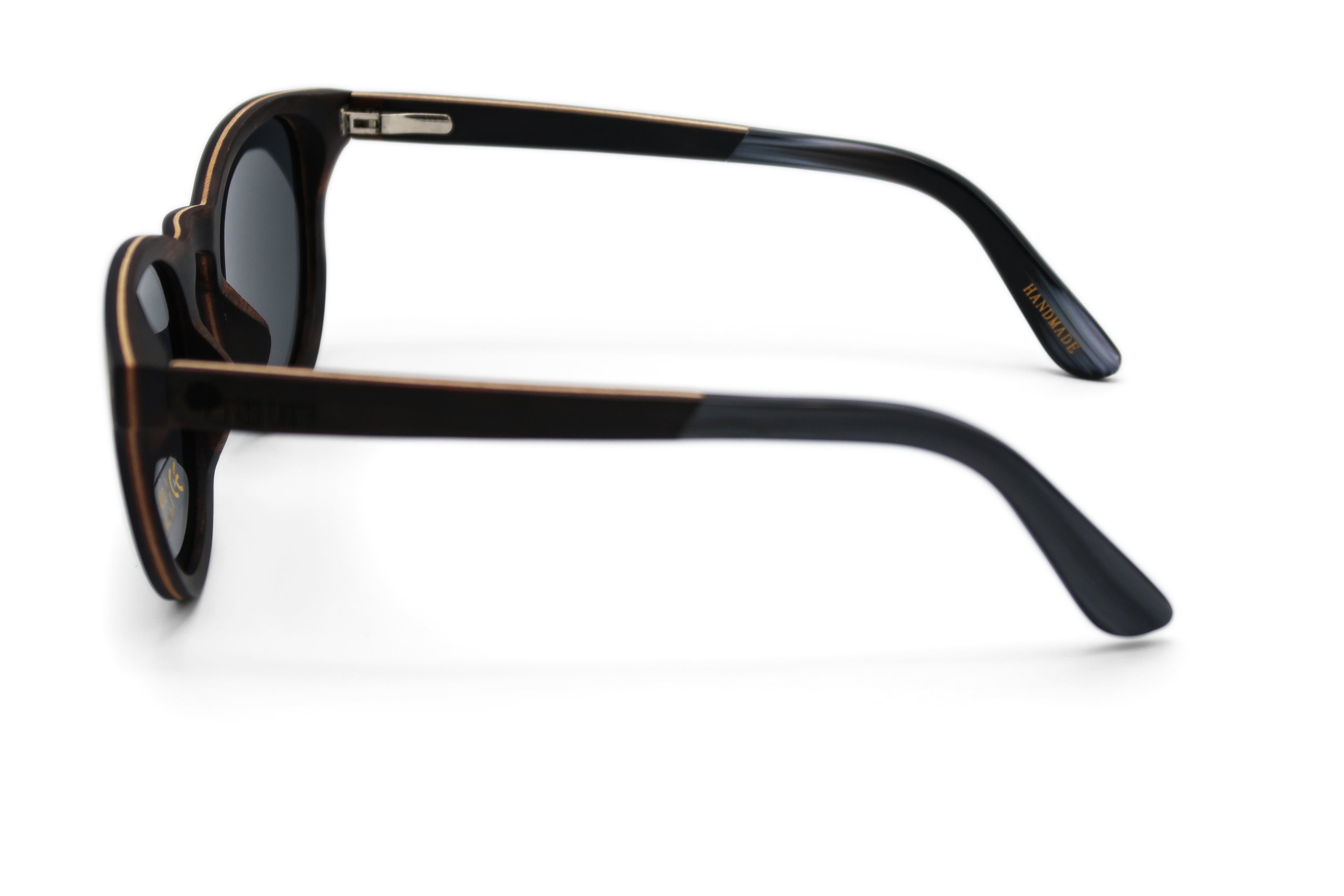 Santa Monica sunglasses featuring a stylish zebra wood frame and polarized lenses, perfect for sun protection and outdoor activities.