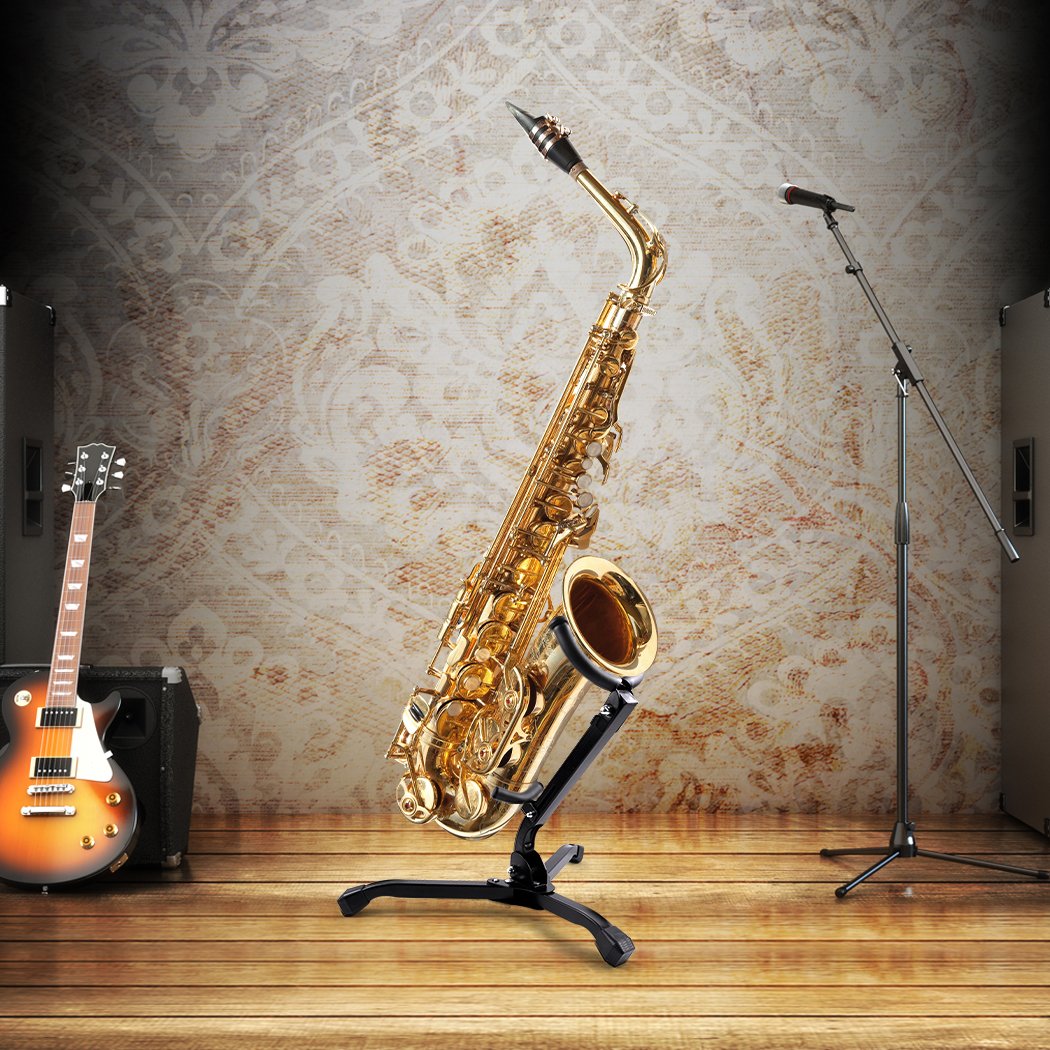 Foldable saxophone stand with tripod design, padded holder, and adjustable backrest for alto and tenor saxophones.