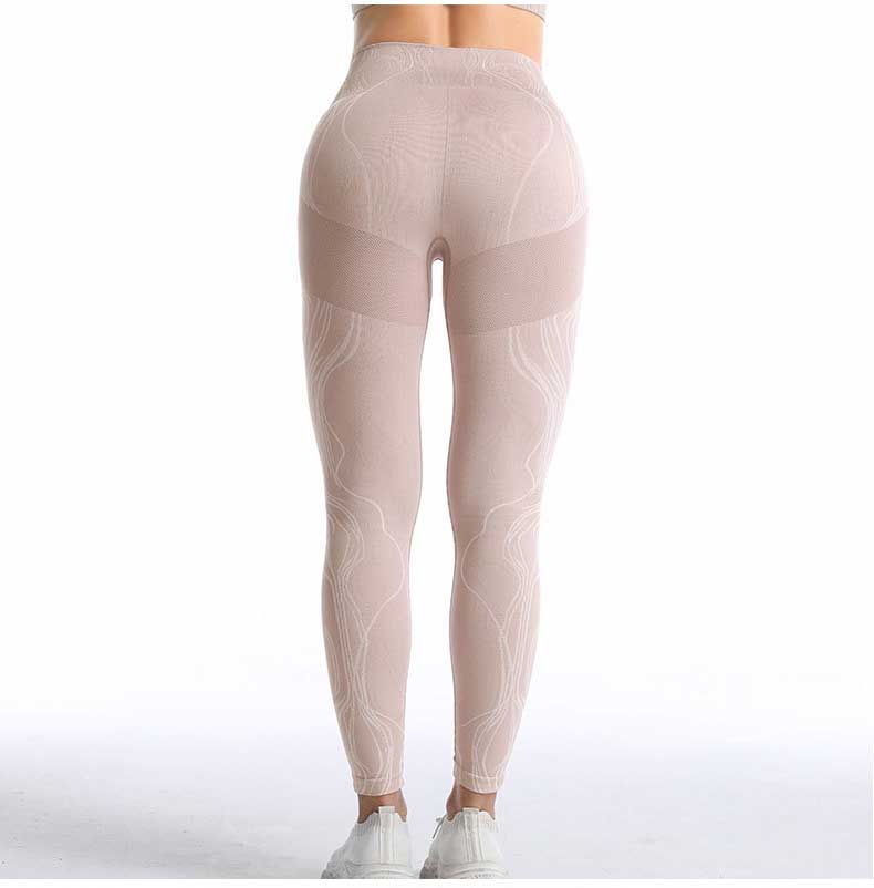 Seamless gym set featuring high waist leggings and sports bra in leopard pattern, available in black, pink, and blue.