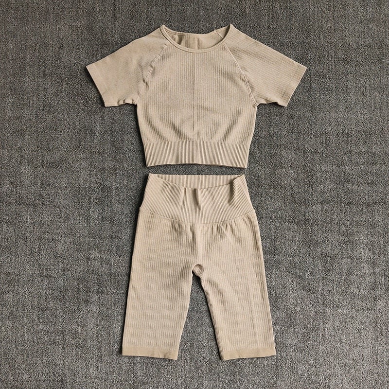 Seamless Yoga Set for Women featuring a crop top and high waist shorts in various colors, perfect for yoga and gym workouts.