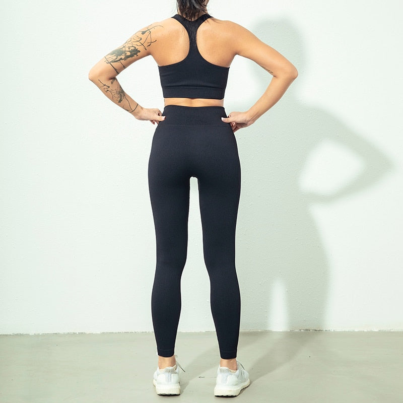 Seamless Yoga Set featuring a zipper long sleeve top and high waist leggings in various colors, perfect for women's workouts.