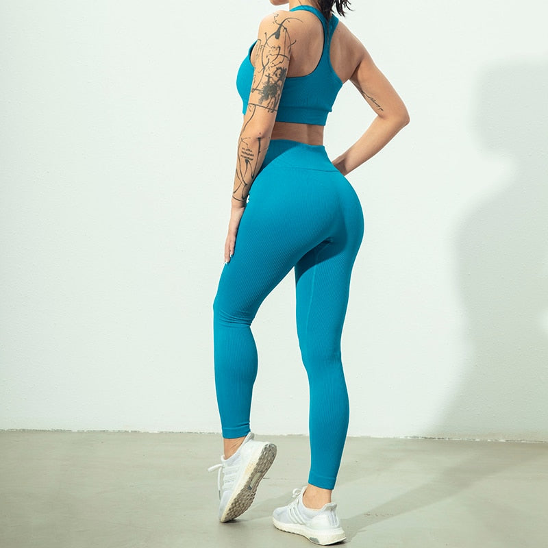 Seamless Yoga Set featuring a zipper long sleeve top and high waist leggings in various colors, perfect for women's workouts.