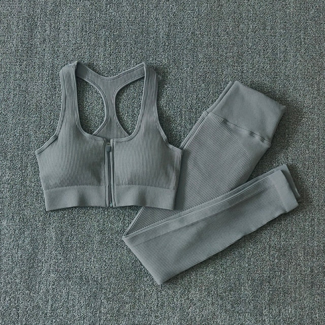 Seamless Yoga Set featuring a zipper long sleeve top and high waist leggings in various colors, perfect for women's workouts.