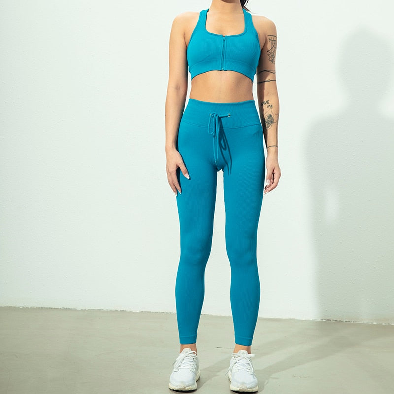 Seamless Yoga Set featuring a zipper long sleeve top and high waist leggings in various colors, perfect for women's workouts.