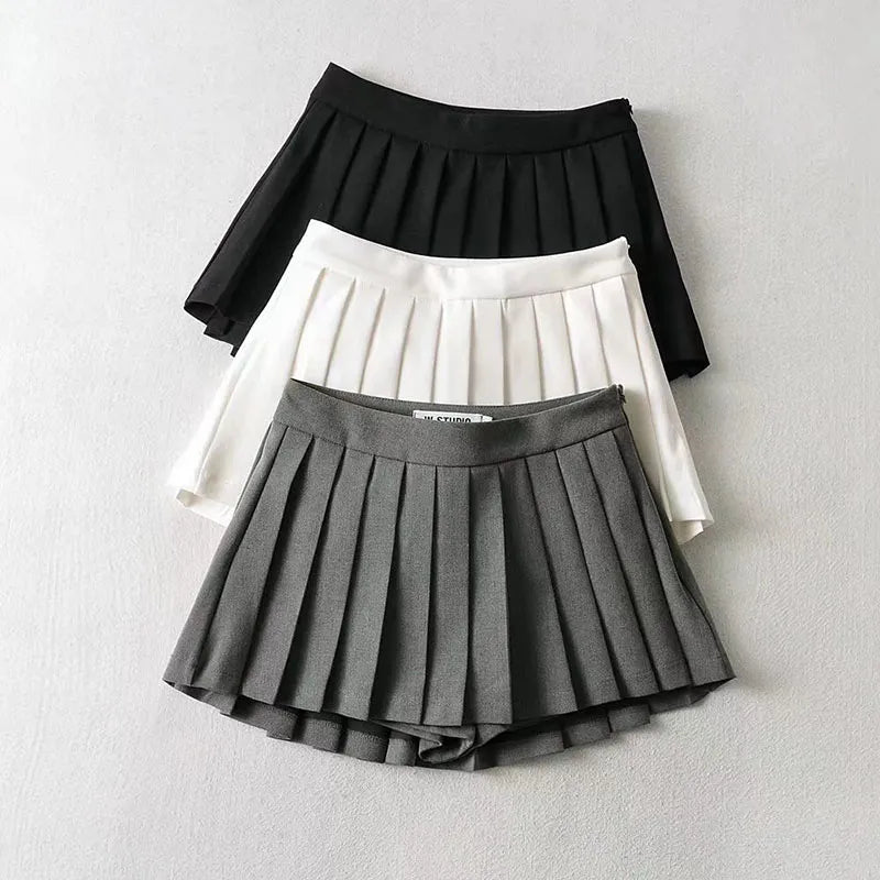 A stylish high waist pleated mini skirt for women, featuring a vintage design in solid color, perfect for summer and casual occasions.