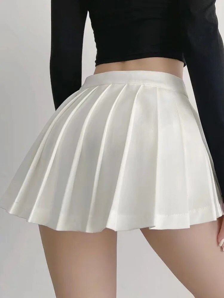 A stylish high waist pleated mini skirt for women, featuring a vintage design in solid color, perfect for summer and casual occasions.