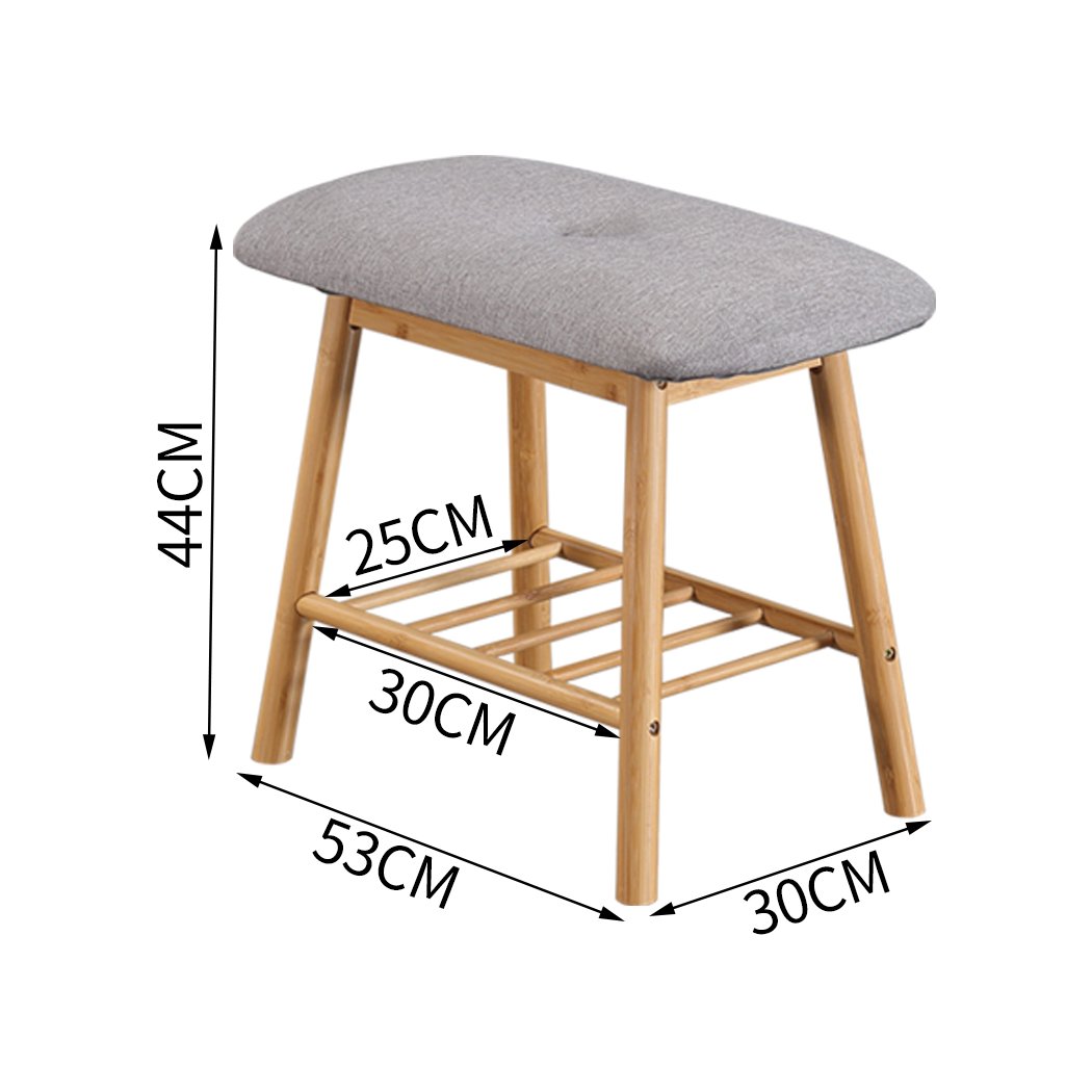Bamboo shoe bench with cushion seat, stylish and compact design for entryway storage.