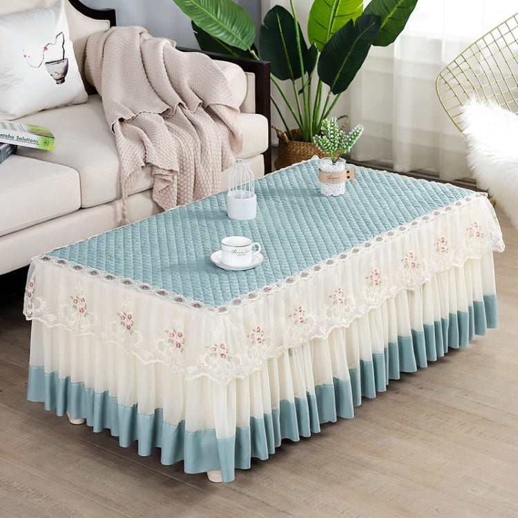 Simple Fabric Lace Rectangular Tablecloth in peach skin color, made of crystal velvet, elegantly draped over a table.
