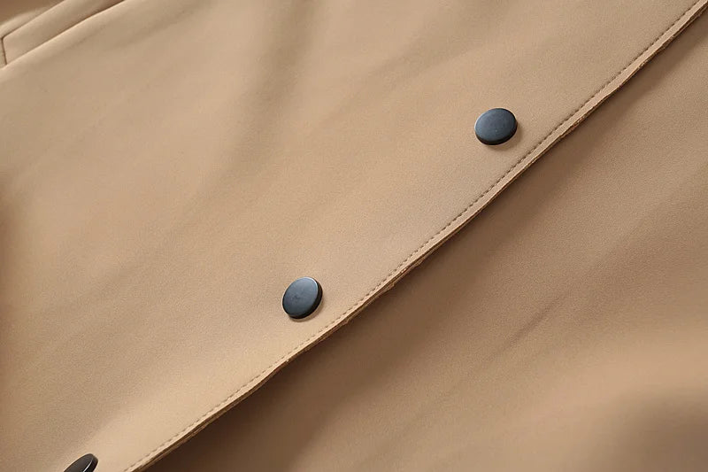 A stylish mid-length windbreaker in soft air cotton fabric, perfect for autumn fashion, featuring a trench coat design suitable for women.