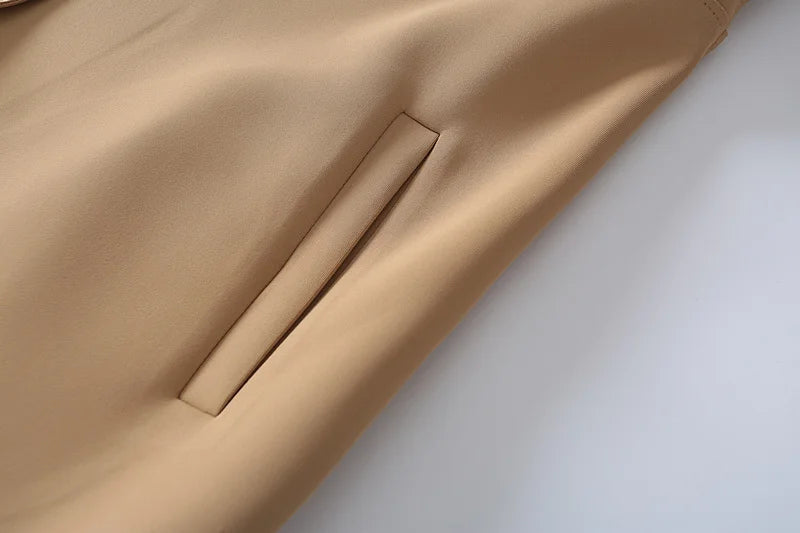 A stylish mid-length windbreaker in soft air cotton fabric, perfect for autumn fashion, featuring a trench coat design suitable for women.