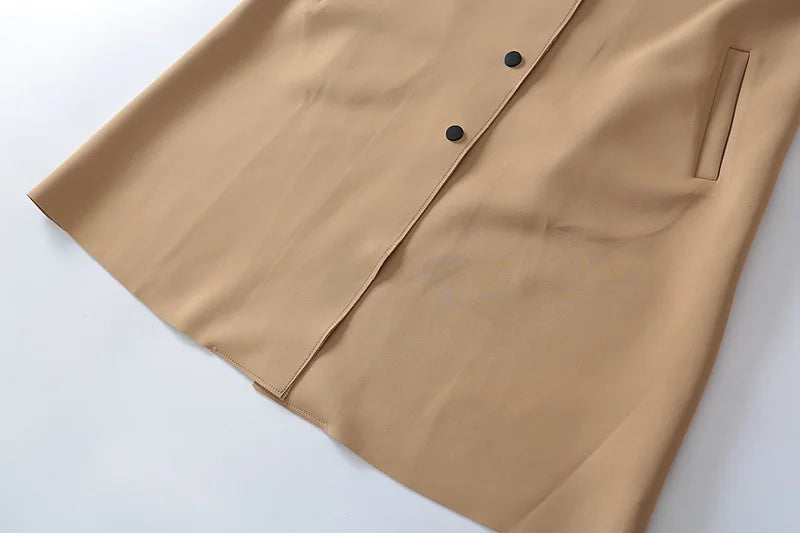 A stylish mid-length windbreaker in soft air cotton fabric, perfect for autumn fashion, featuring a trench coat design suitable for women.