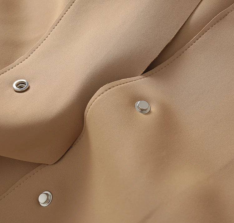 A stylish mid-length windbreaker in soft air cotton fabric, perfect for autumn fashion, featuring a trench coat design suitable for women.