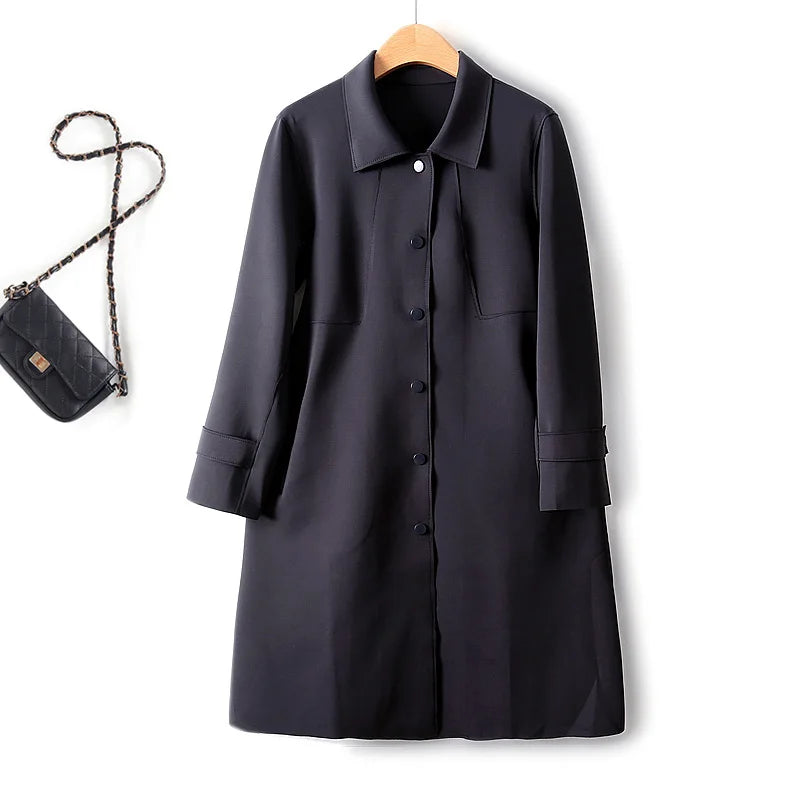 A stylish mid-length windbreaker in soft air cotton fabric, perfect for autumn fashion, featuring a trench coat design suitable for women.