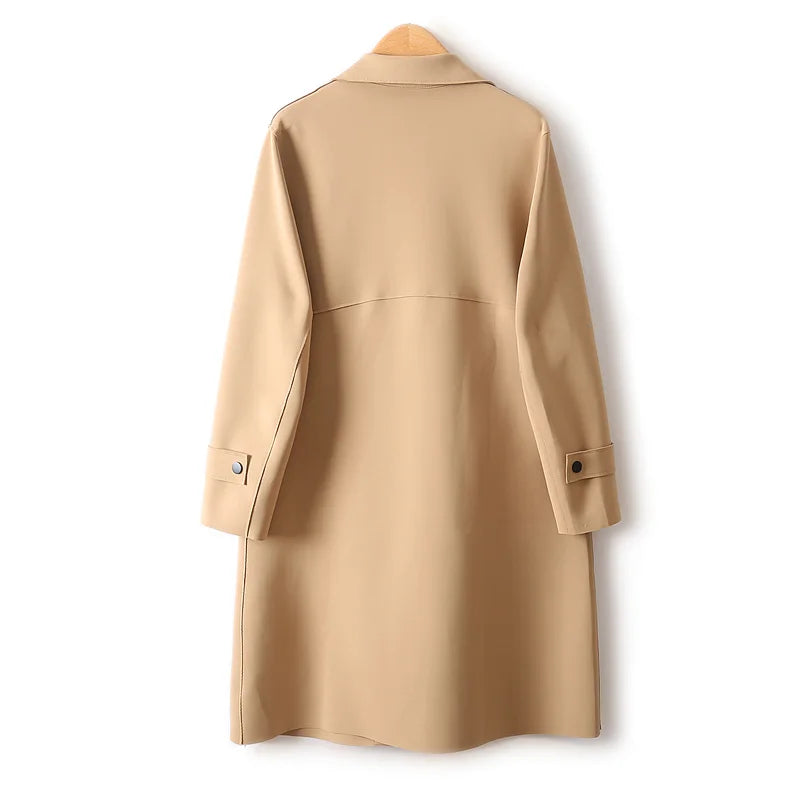 A stylish mid-length windbreaker in soft air cotton fabric, perfect for autumn fashion, featuring a trench coat design suitable for women.