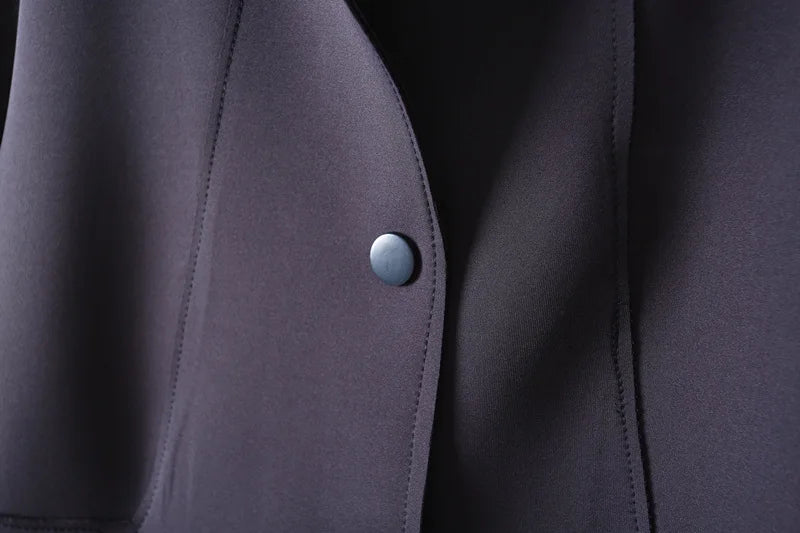 A stylish mid-length windbreaker in soft air cotton fabric, perfect for autumn fashion, featuring a trench coat design suitable for women.