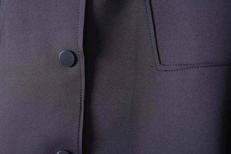 A stylish mid-length windbreaker in soft air cotton fabric, perfect for autumn fashion, featuring a trench coat design suitable for women.