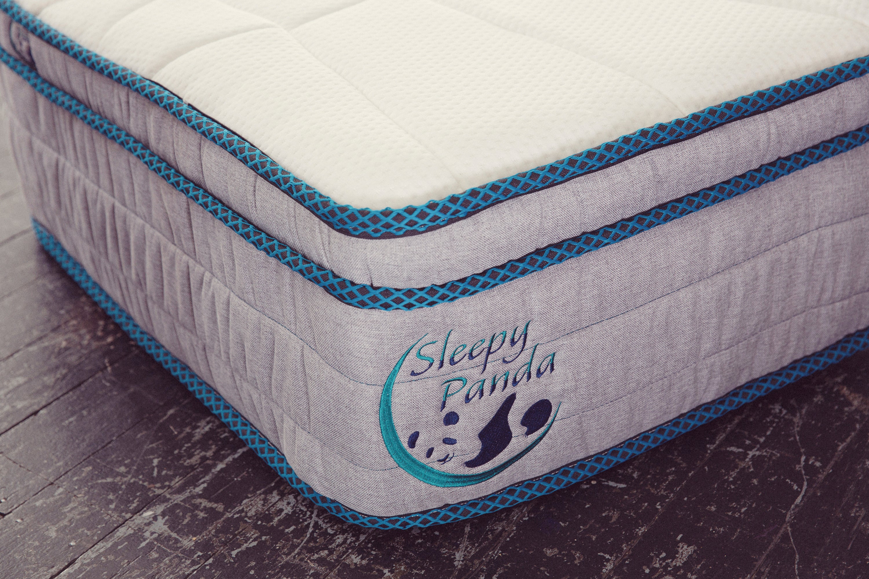 Sleepy Panda Mattress showcasing 5-zone pocket springs and natural latex layer, designed for medium-firm comfort.