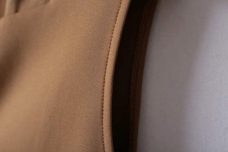 A stylish sleeveless vest for women, made from soft nylon cotton fabric, perfect for spring and autumn wear.