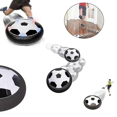 Slide And Glide Indoor Soccer Hover Ball with LED lights, floating above a smooth surface, showcasing its foam bumper.