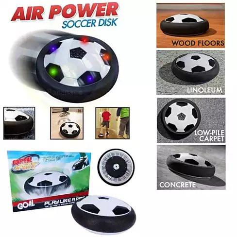Slide And Glide Indoor Soccer Hover Ball with LED lights, floating above a smooth surface, showcasing its foam bumper.
