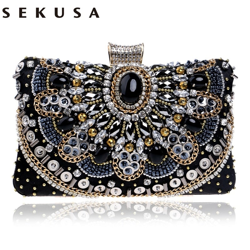 Elegant small black beaded clutch purse with metal chain strap, perfect for evening events and weddings.