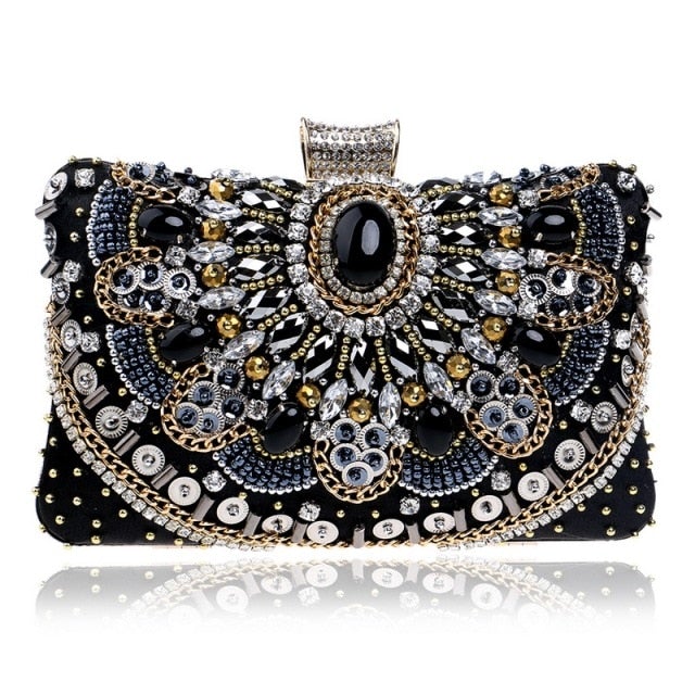 Elegant small black beaded clutch purse with metal chain strap, perfect for evening events and weddings.